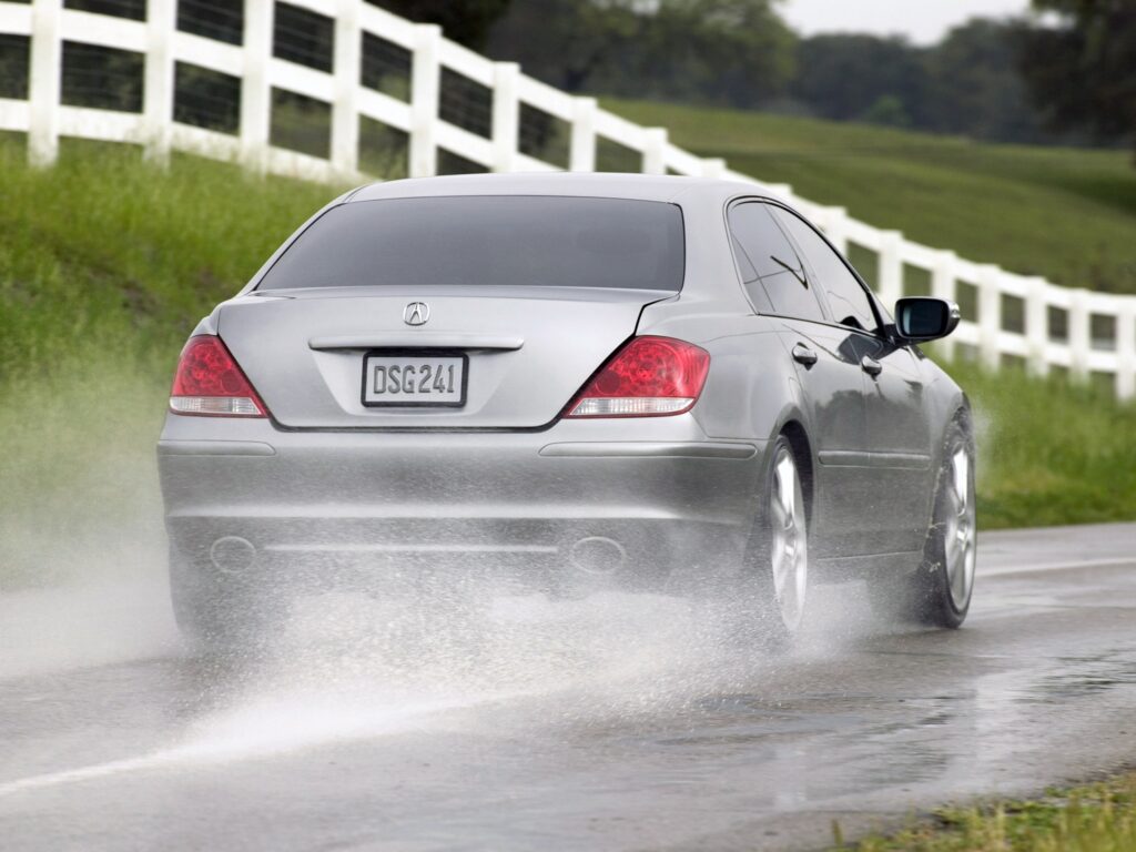 Gray Metallic Acura RL Concept Car on Wet Road - Nature Background Wallpaper