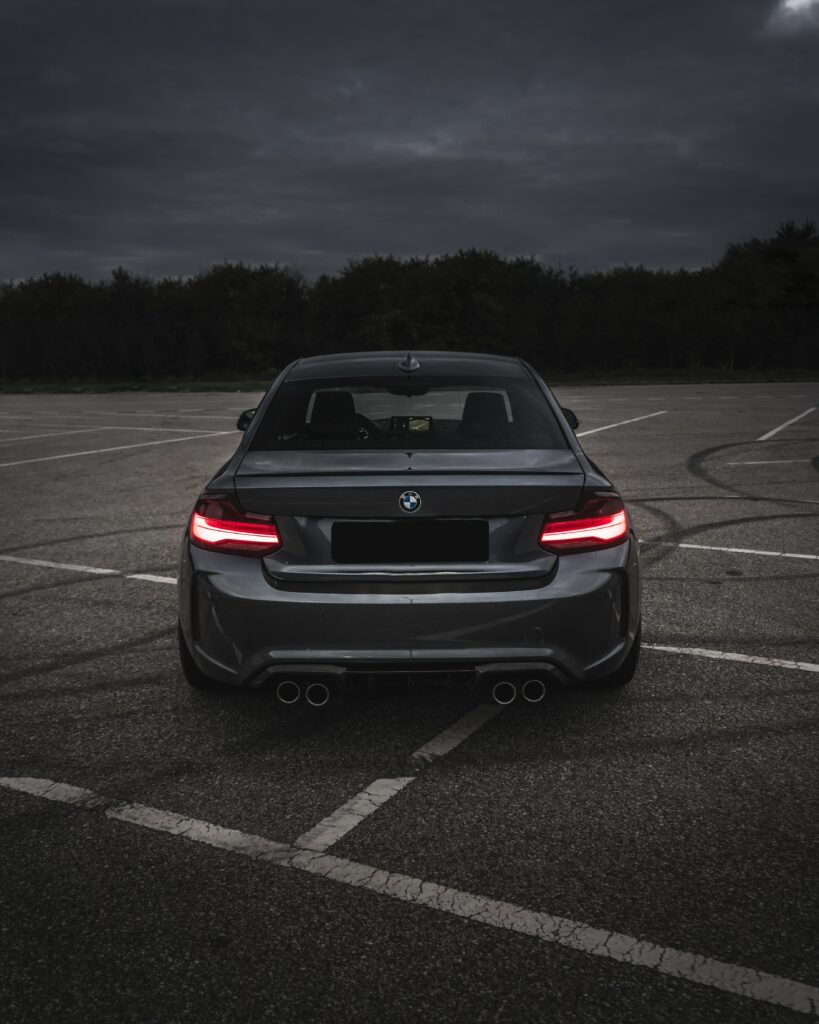 Elegant Gray BMW M3 Rear View Wallpaper: Sporty & Sophisticated Design