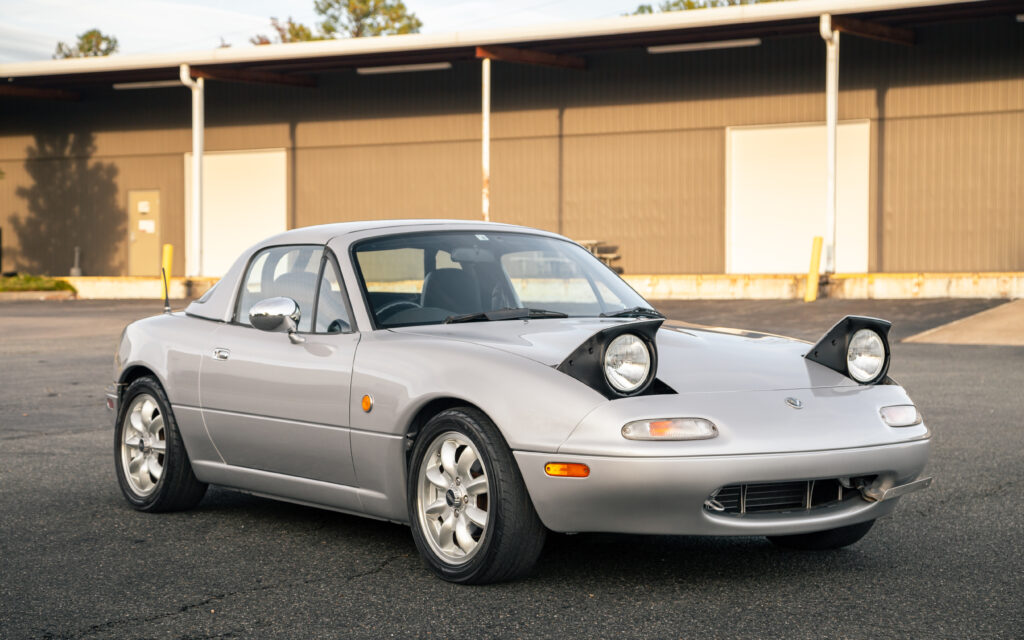 Sleek Gray Mazda MX-5 Wallpaper in Industrial Setting - Sporty Elegance