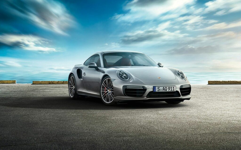 Elegant Gray Porsche 911 Turbo in Scenic Side View Wallpaper