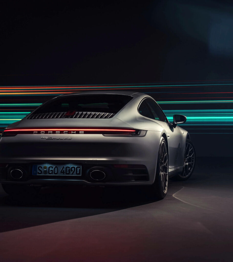 Sleek Gray Porsche 911 Wallpaper: Iconic Design & Dynamic Background