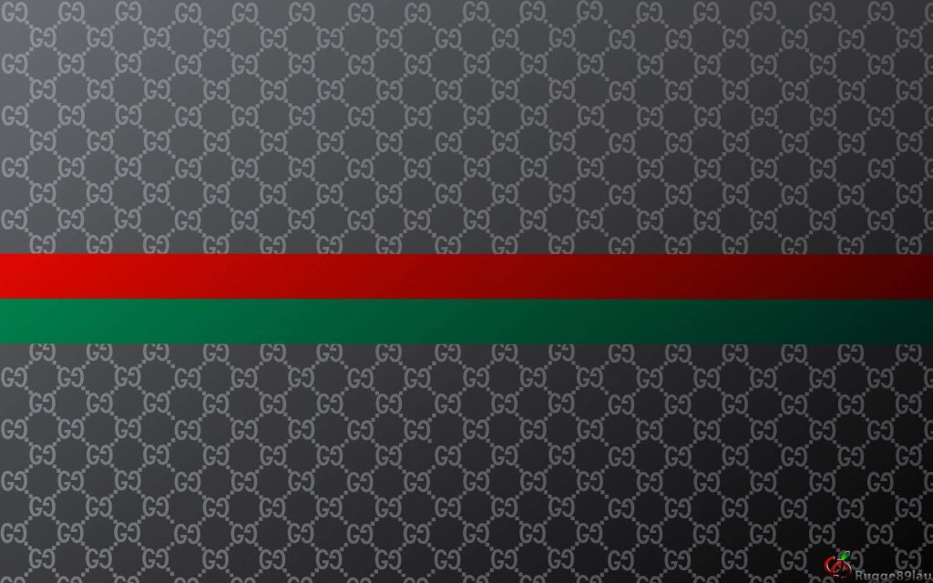 Gucci wallpaper with interlocking GG monogram and red green signature web stripe on charcoal