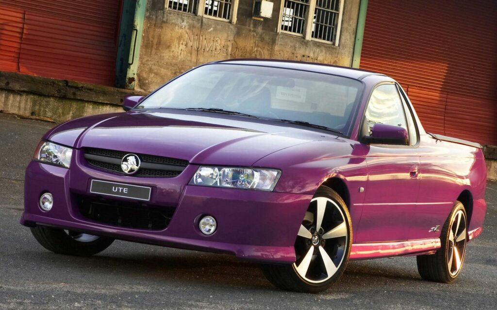 Holden Commodore VZ Pickup Wallpaper: Bold Purple Design & Industrial Backdrop