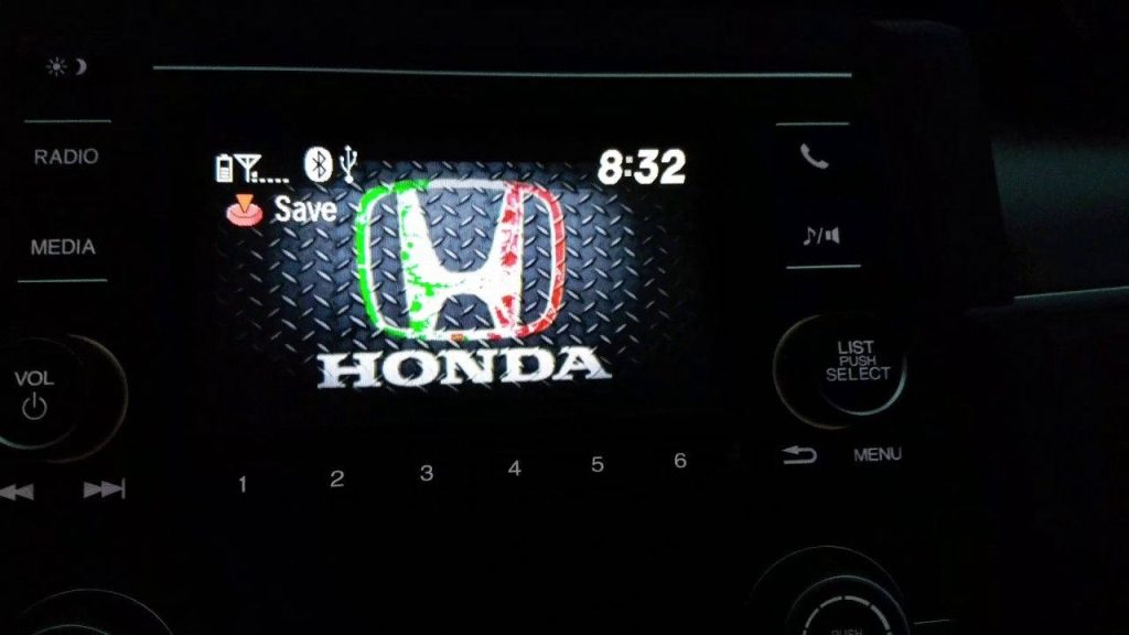 Honda infotainment wallpaper with red logo on silver diamond plate metal texture background