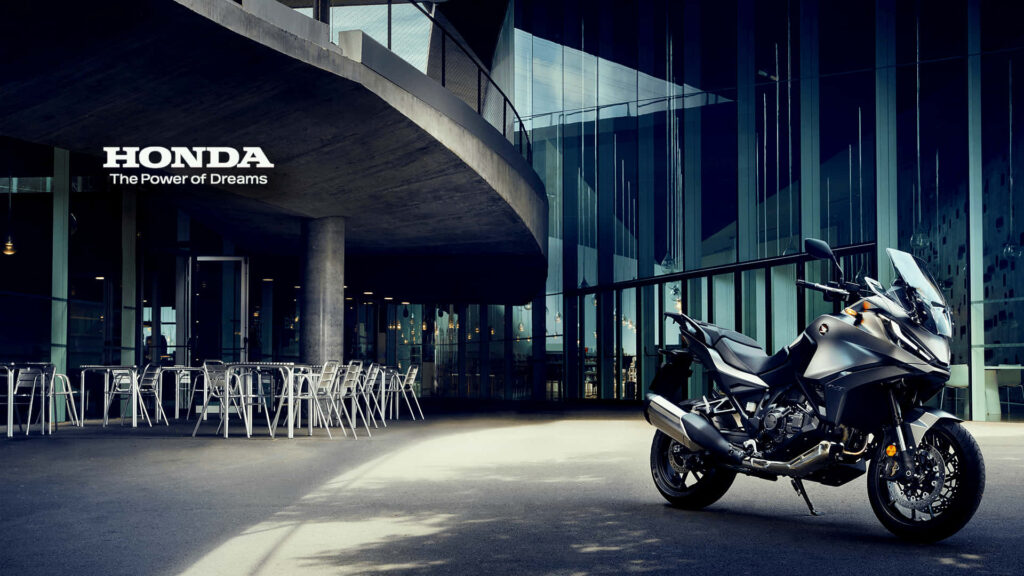 Sleek Honda Motorcycle Wallpaper in Modern Urban Setting