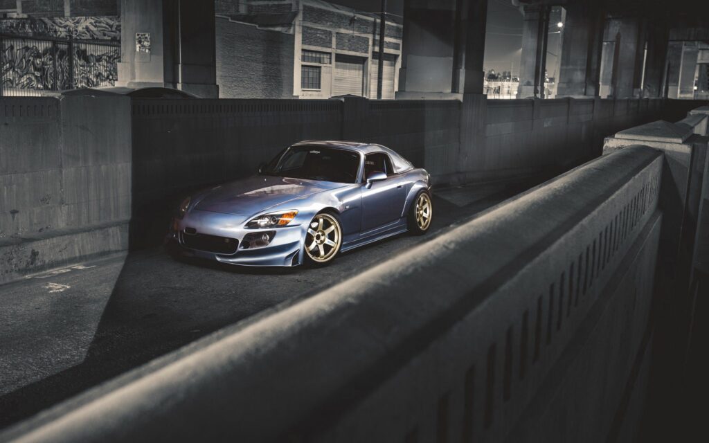 Sleek Honda S2000: Striking Urban Wallpaper with Ambient Lighting