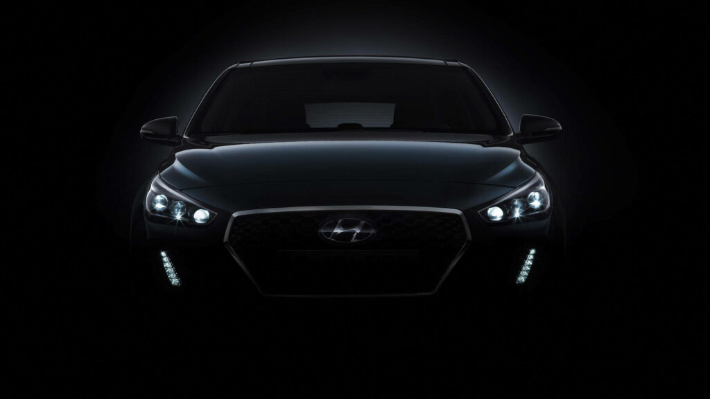 Eye-Catching Hyundai Car Wallpaper with Dramatic Black Background