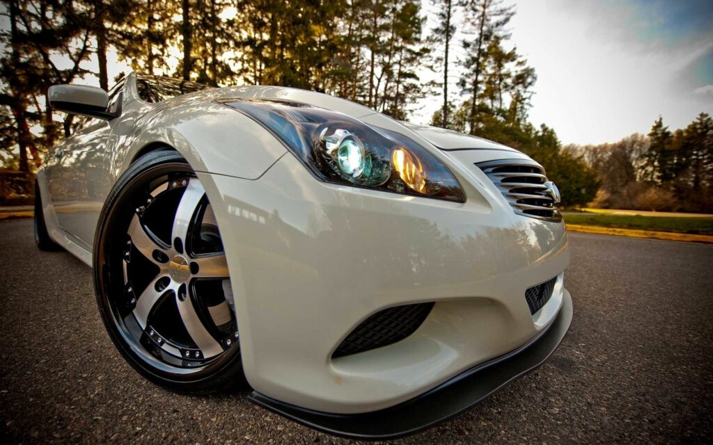 Sleek Infiniti Car Close-Up in Scenic Outdoor Setting Wallpaper