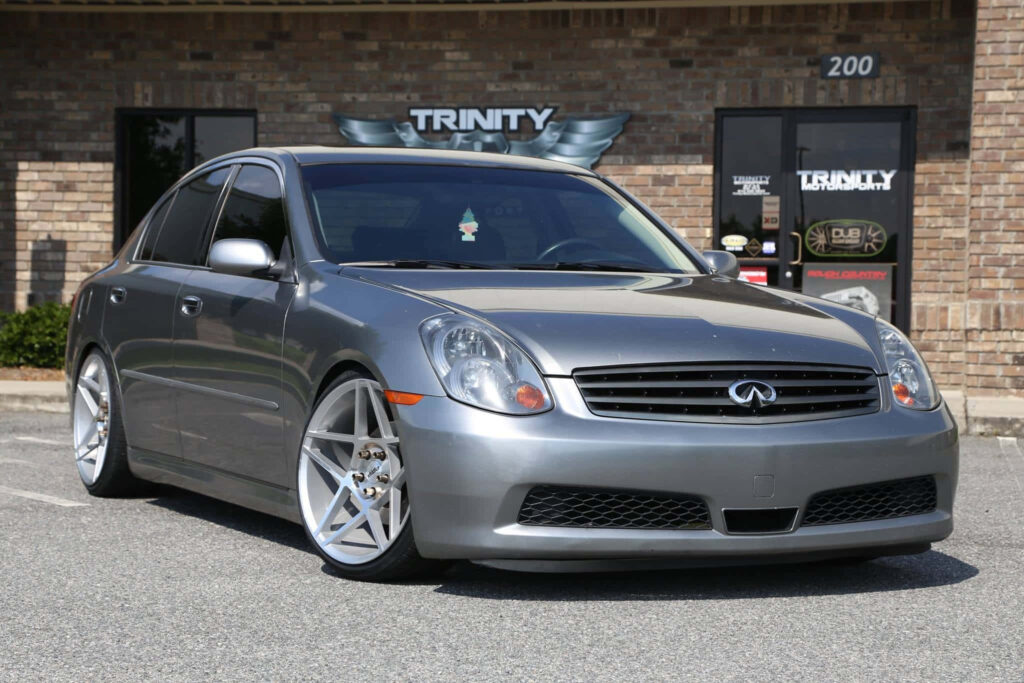Sleek Infiniti G35 Sedan Wallpaper - Stylish Metallic Silver Background