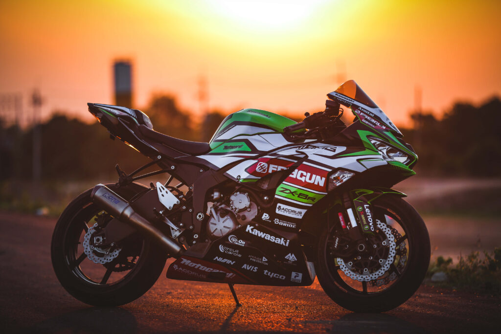 Kawasaki Motorcycle Sunset Wallpaper: Sleek Design & Vibrant Colors