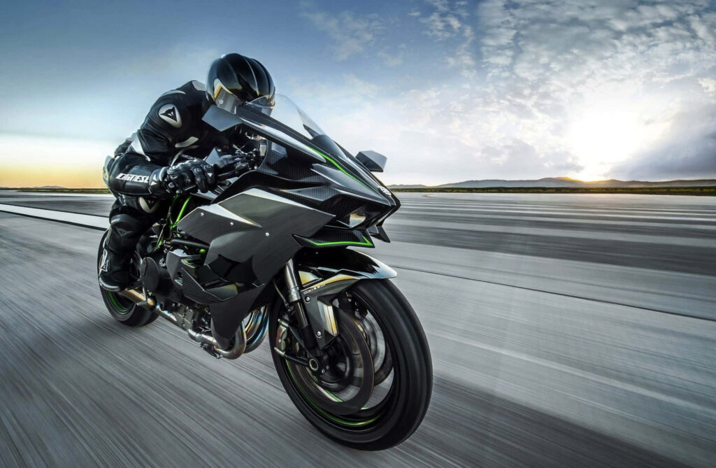 Thrilling Kawasaki Motorcycle Wallpaper: Speed & Adventure Background