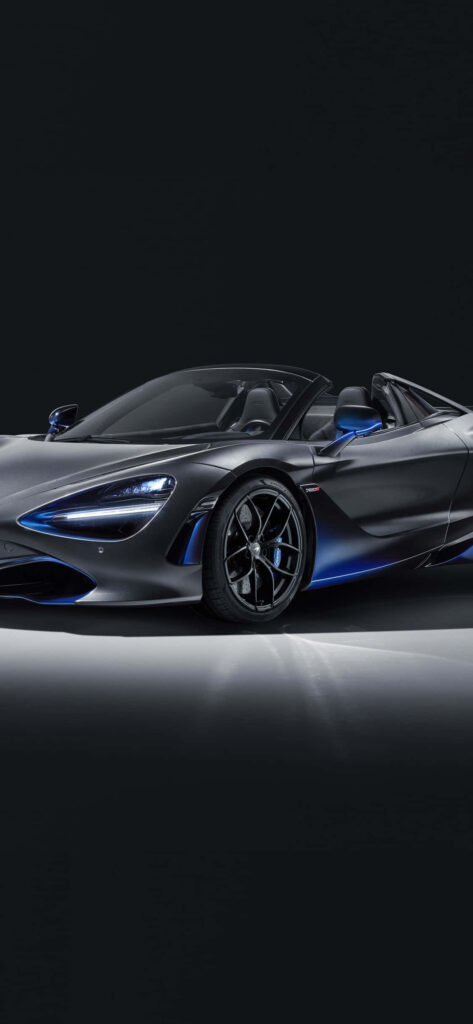 McLaren 720S Scale Model Wallpaper: Sleek Design on Dark Background