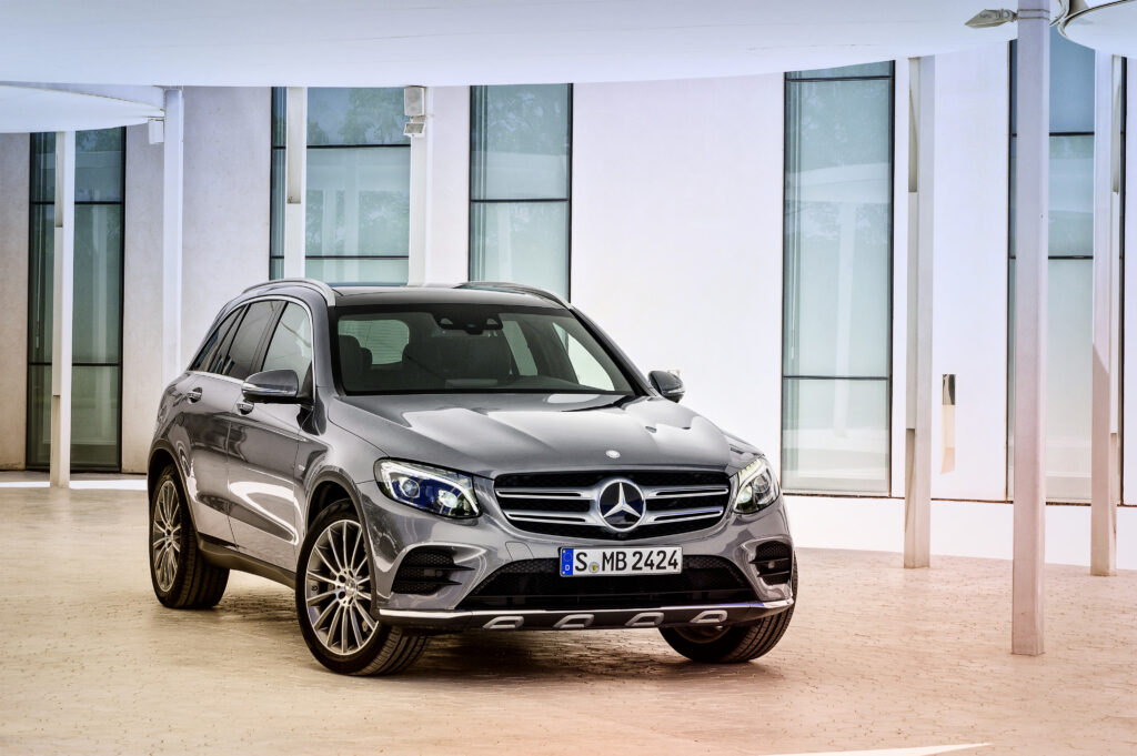 Sleek Mercedes-Benz GLK 350 4MATIC in Modern Minimalist Setting Wallpaper