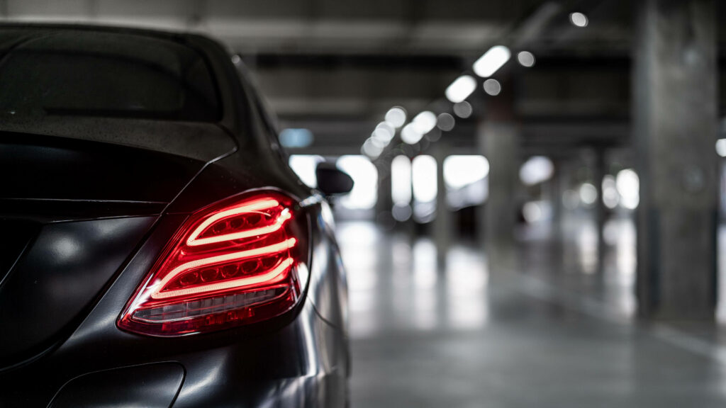 Modern Mercedes-Benz Wallpaper: Sleek Taillights in Parking Garage