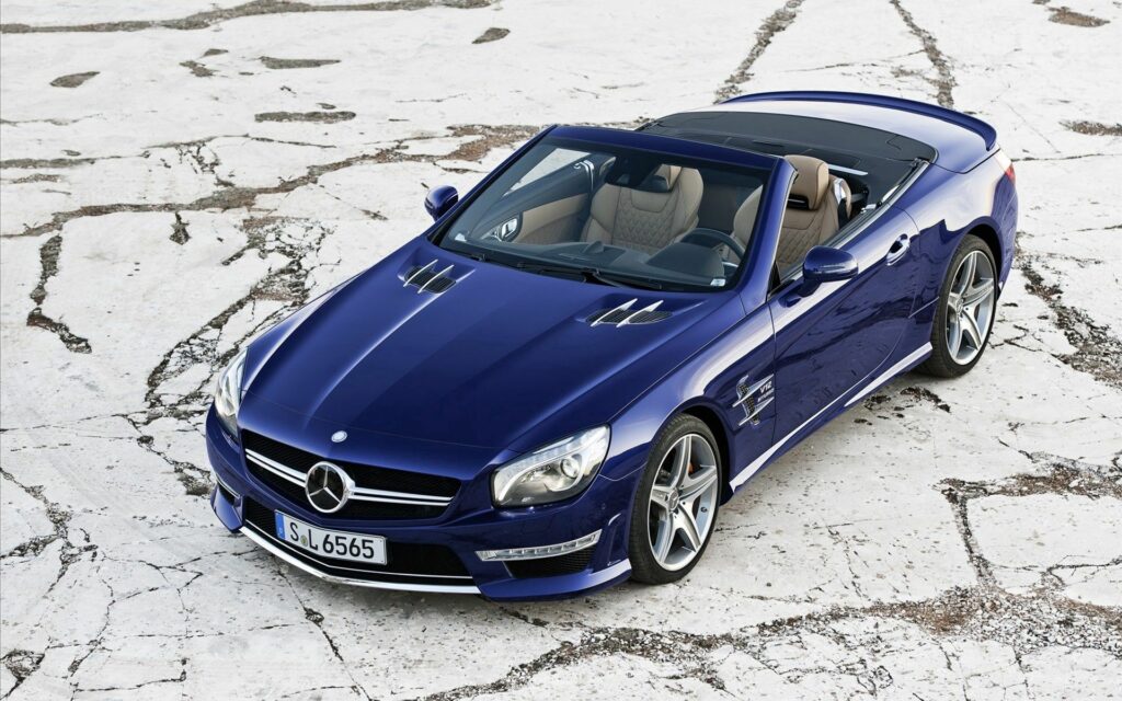 Sleek Mercedes-Benz SL65 AMG Convertible on Rugged Background Wallpaper