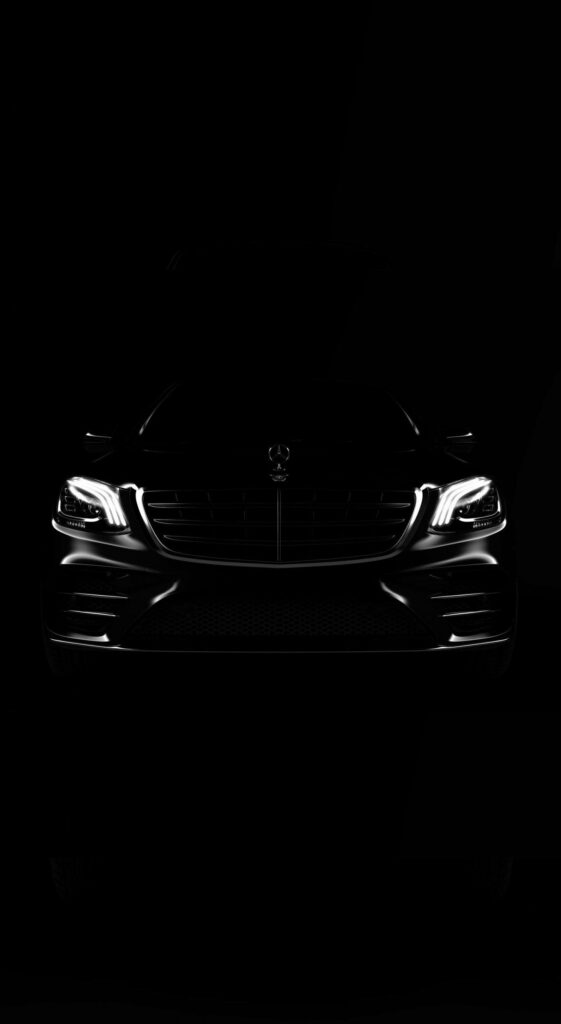Elegant Mercedes-Benz Wallpaper: Striking Front View & Stylish Headlights
