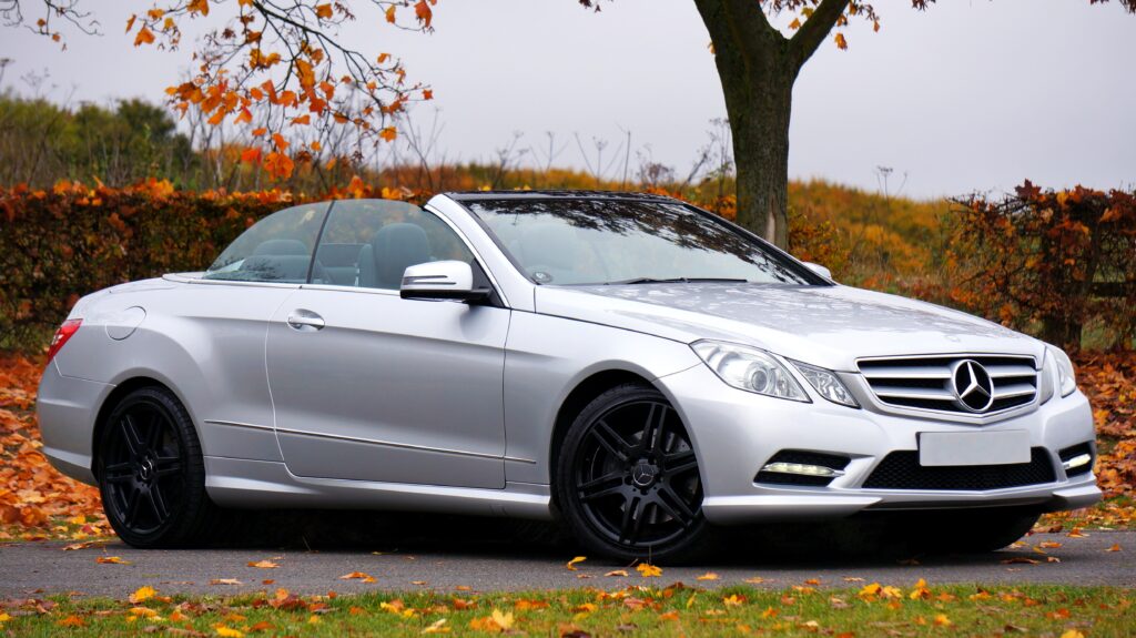 Elegant Mercedes E-Class Convertible Wallpaper in Autumn Setting