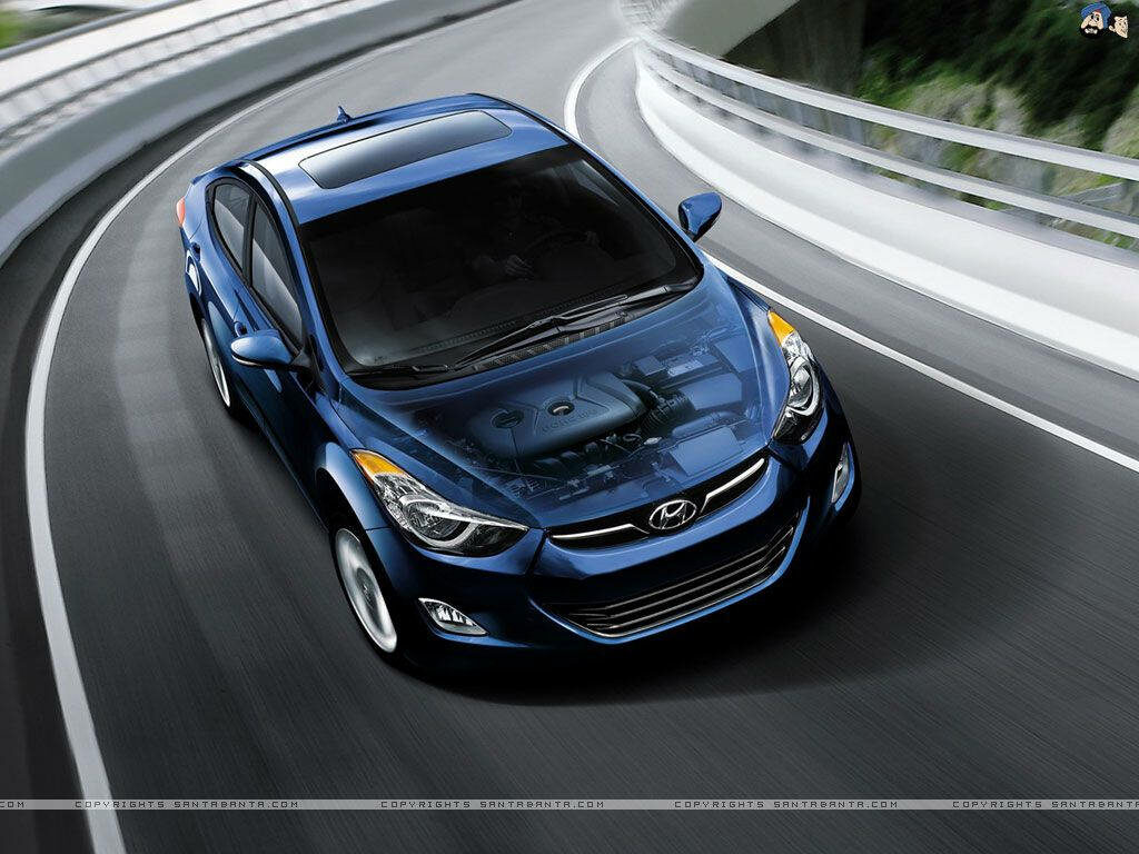 Metallic Blue Hyundai Wallpaper: Sleek Car & Engine in Dynamic Setting