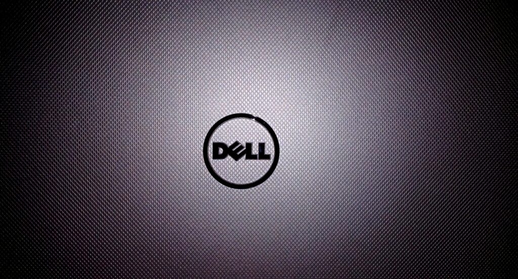 Dell wallpaper with metallic texture dotted pattern and cool gray tones featuring Dell logo center