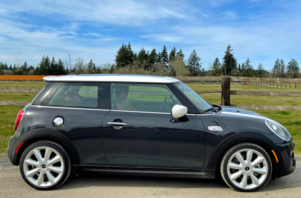 Stylish Mini Cooper Hardtop 2 Door Wallpaper - Dynamic Scenic Background