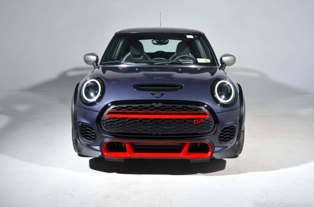 Stylish Mini Cooper Hardtop 2 Door Wallpaper with Bold Red Accents