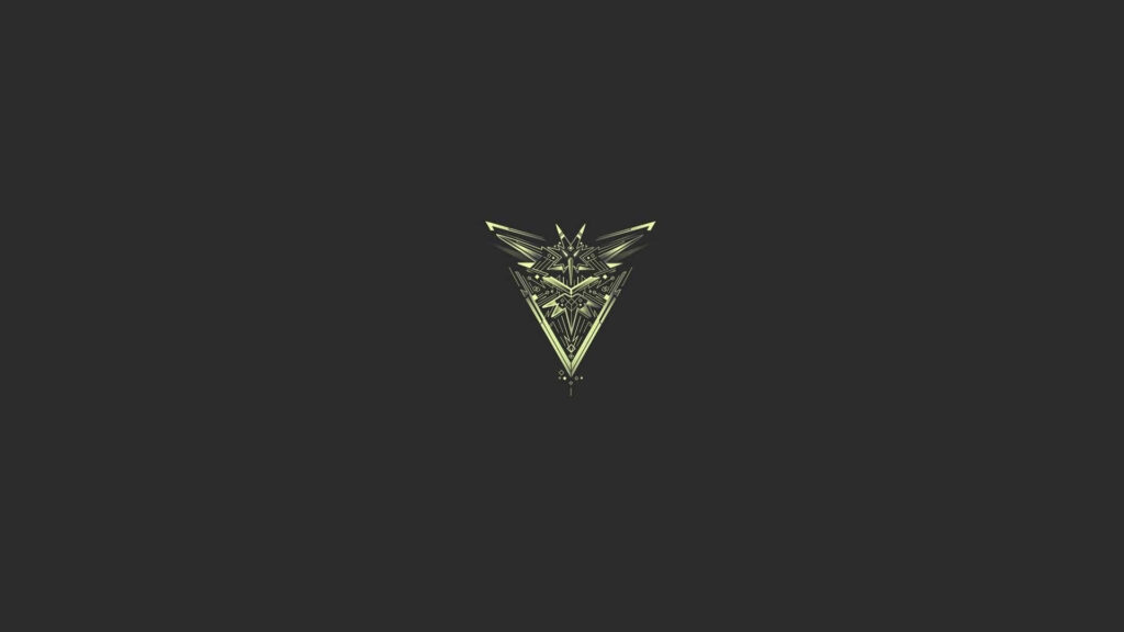 Futuristic Gold Triangle Emblem Wallpaper on Dark Background