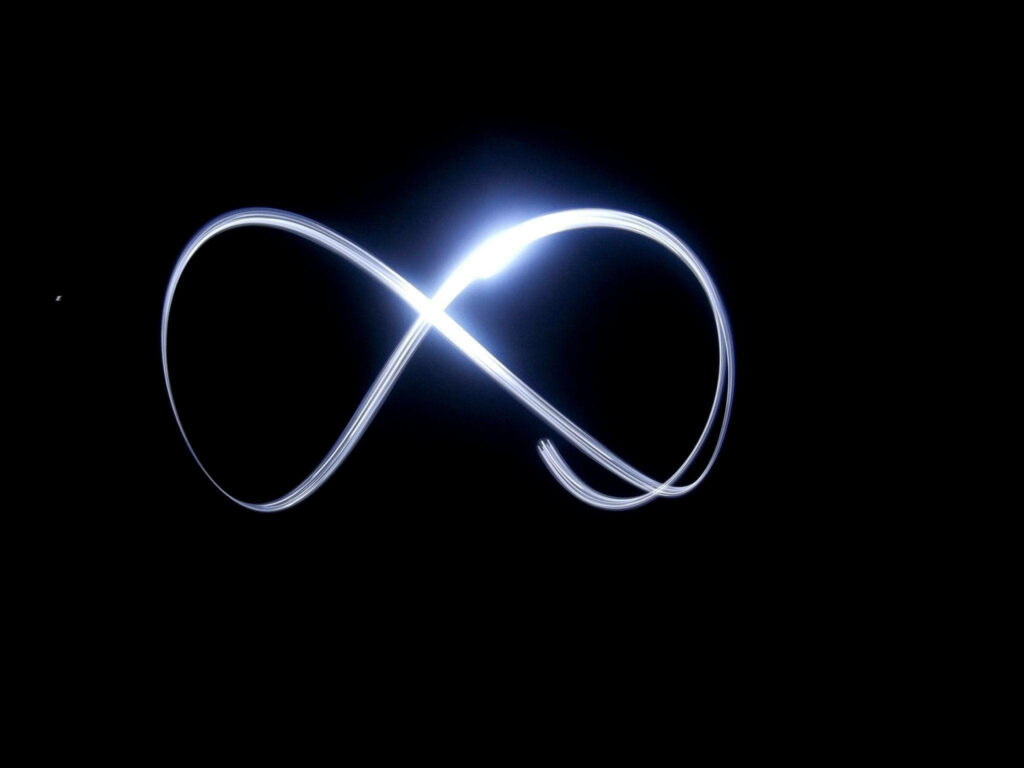 Minimalist Luminous Infinity Symbol Wallpaper - Timeless Elegance