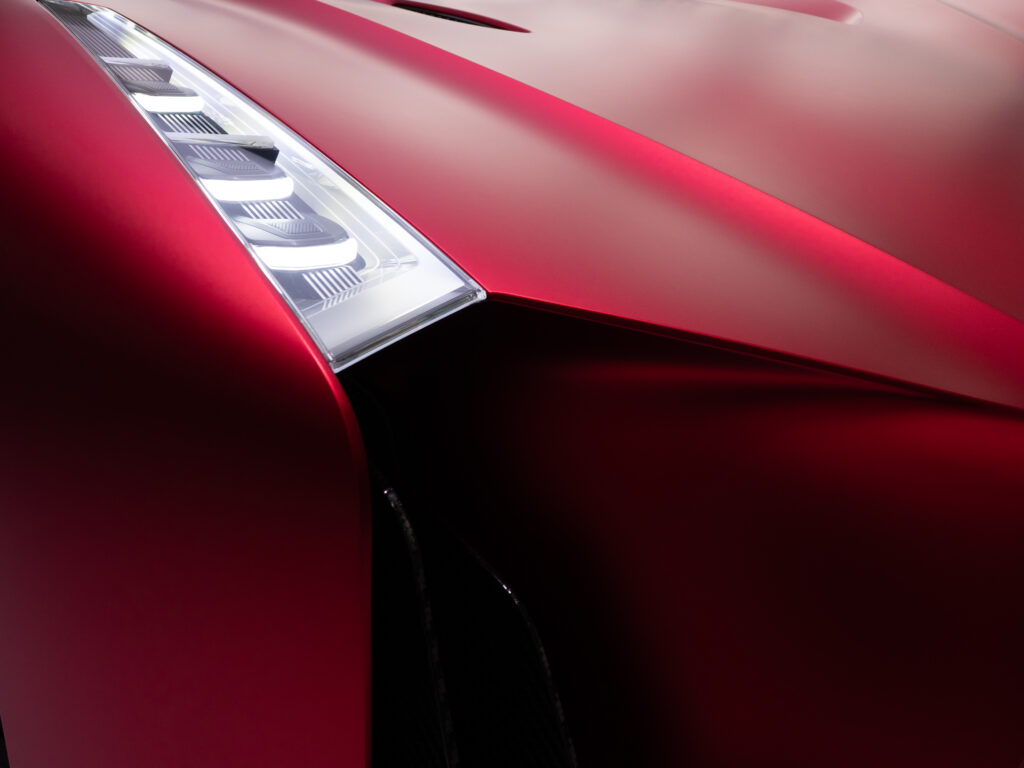 Modern Red Car Wallpaper: Sleek Design & Stylish Headlights