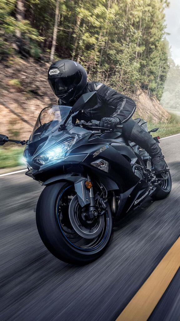 Sleek Motorcycle Rider Adventure Wallpaper for iPhone Users
