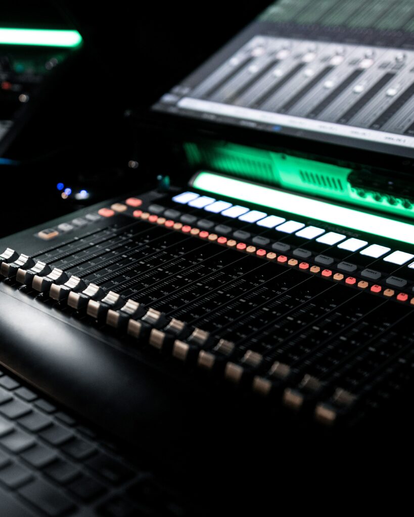 Modern Music Production Setup: Close-Up Mixing Console Wallpaper