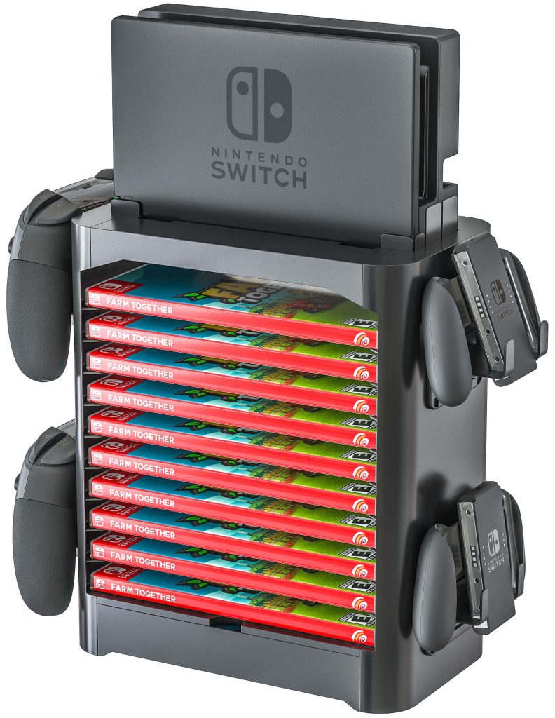 Nintendo Switch charging stand with docked console Joy-Cons and Farm Together game cases on desktop Wallpaper