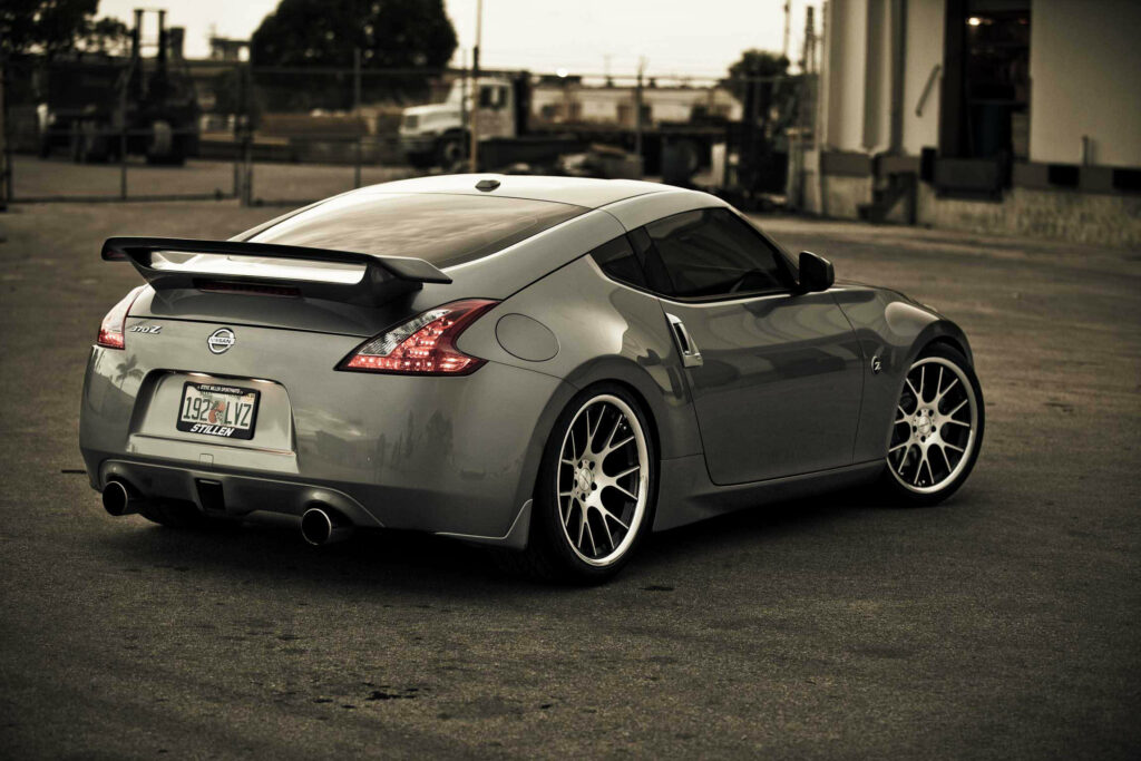 Sleek Nissan 370Z Wallpaper: Sporty Rear View & Urban Vibes