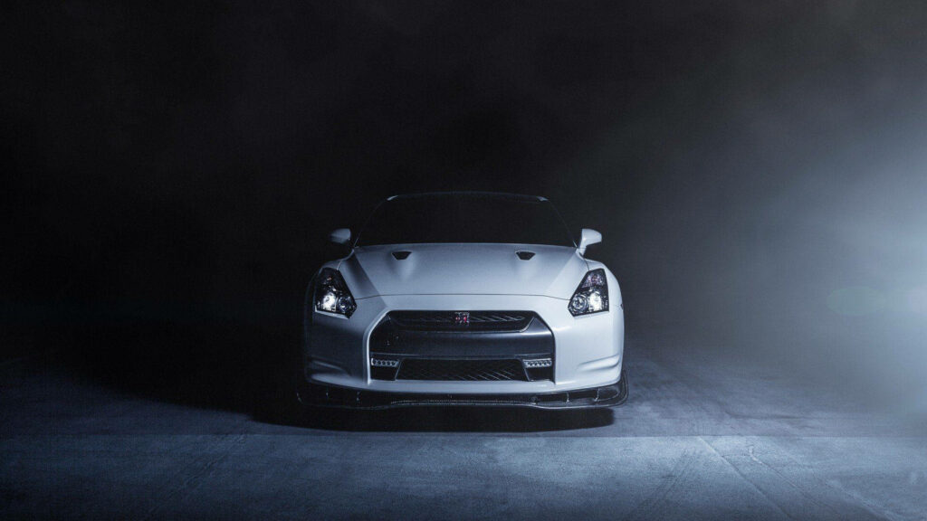 Stunning Nissan GTR Front View: Aggressive Design Wallpaper