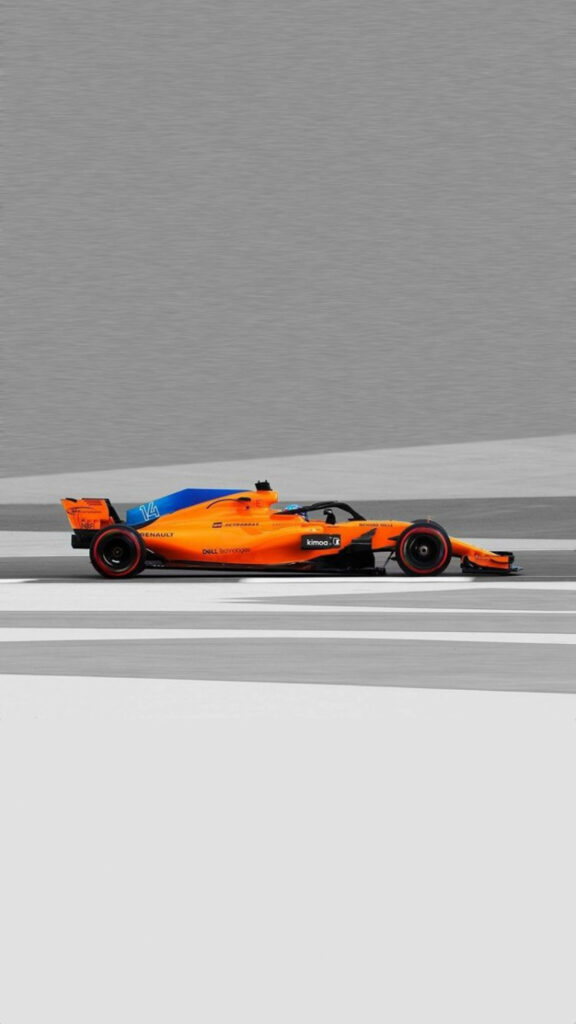 Sleek orange Formula 1 car on muted gray background modern minimalist racing wallpaper design