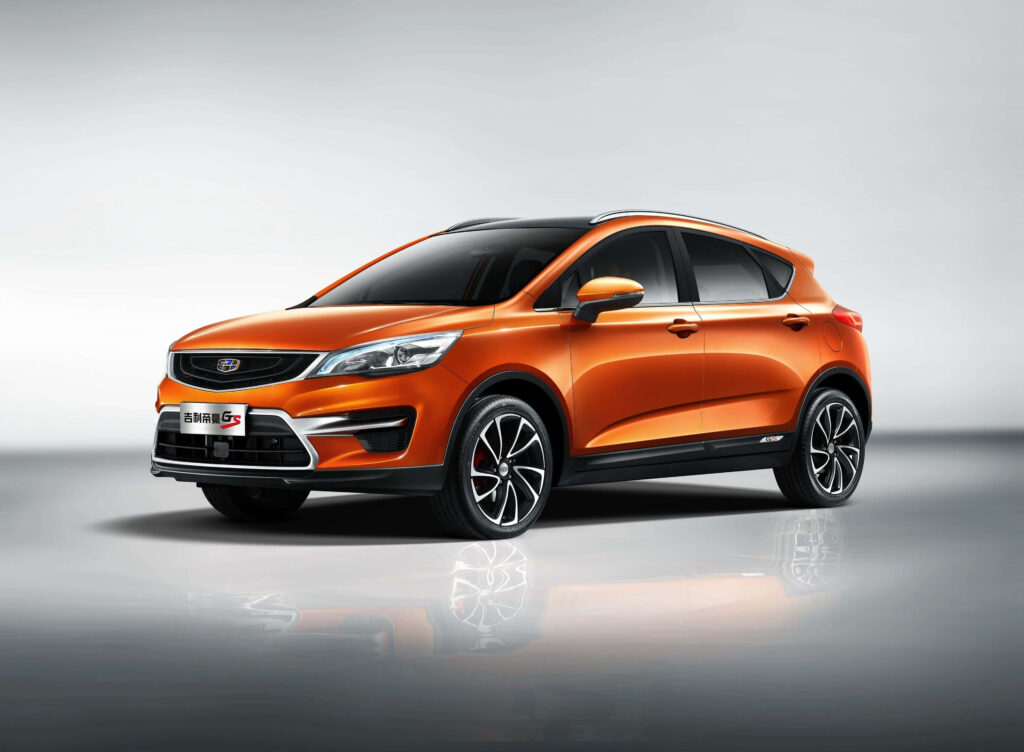 Stylish Orange Geely Sedan Wallpaper Background - Modern Design