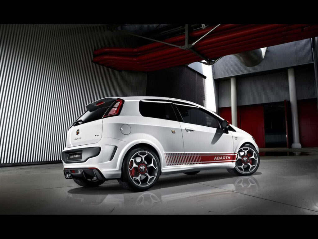 White Abarth Car in a Garage Background Wallpaper
