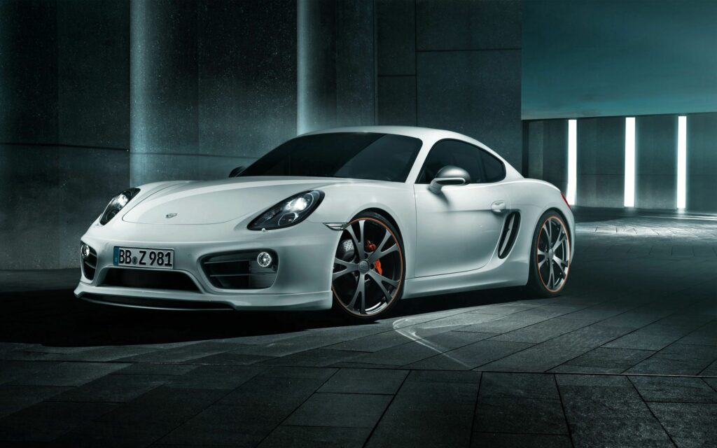 Sleek Porsche Cayman Wallpaper: Elegant Design in Stylish Setting