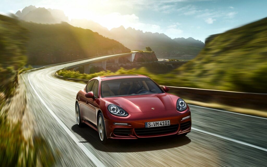Stunning Porsche Panamera Wallpaper: Scenic Road 1920x1200