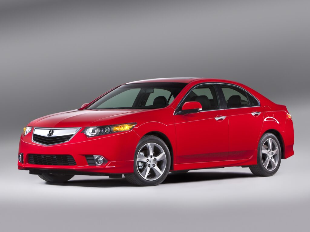 Stylish Red 2011 Acura TSX Side View Wallpaper Against Gray Background