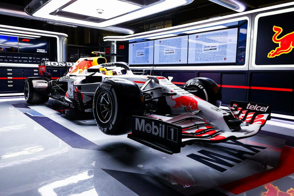 Sophisticated Garage Showcase: Red Bull Racing F1 Car Wallpaper