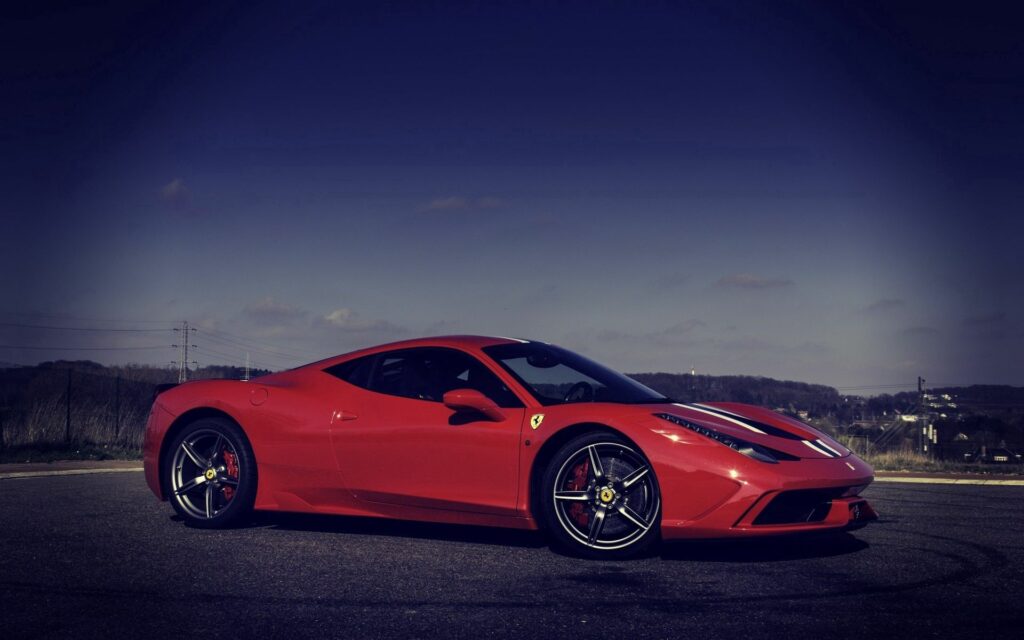 Red Ferrari 458 Speciale Wallpaper: Luxury & Speed in Open Landscape