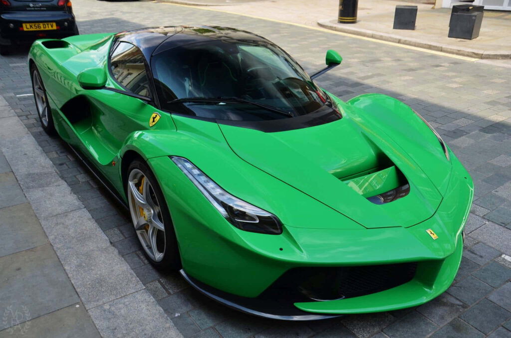 Green Ferrari LaFerrari Parked on a Road Background Wallpaper