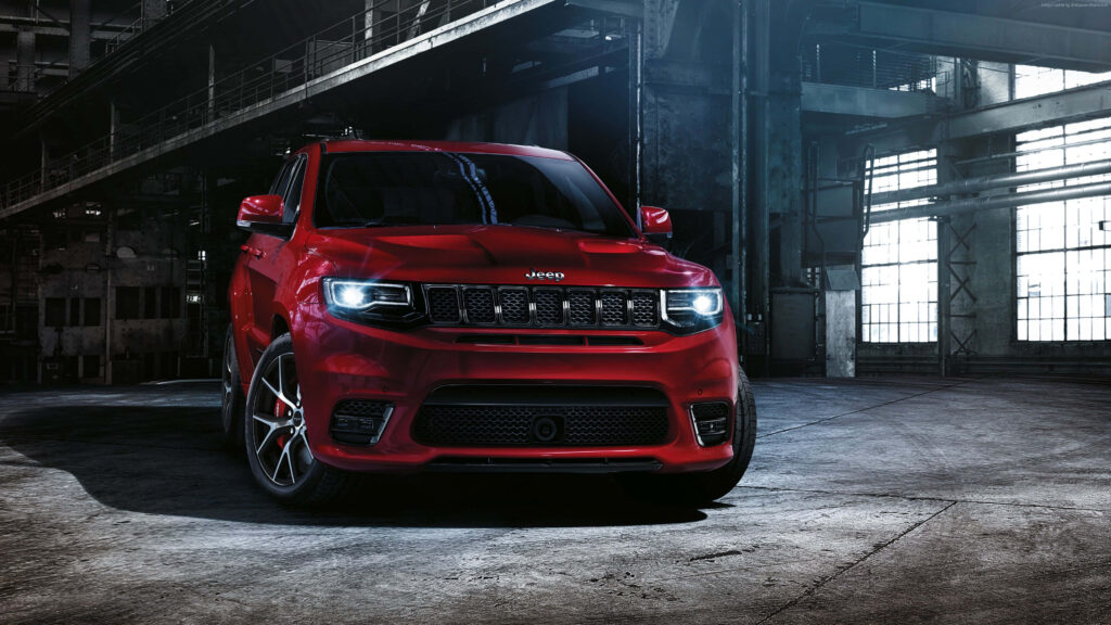 Bold Red Jeep Grand Cherokee: Industrial Wallpaper Design