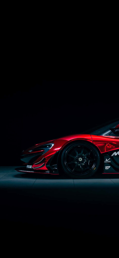 Sleek Red McLaren Racecar Wallpaper: Power & Sophistication