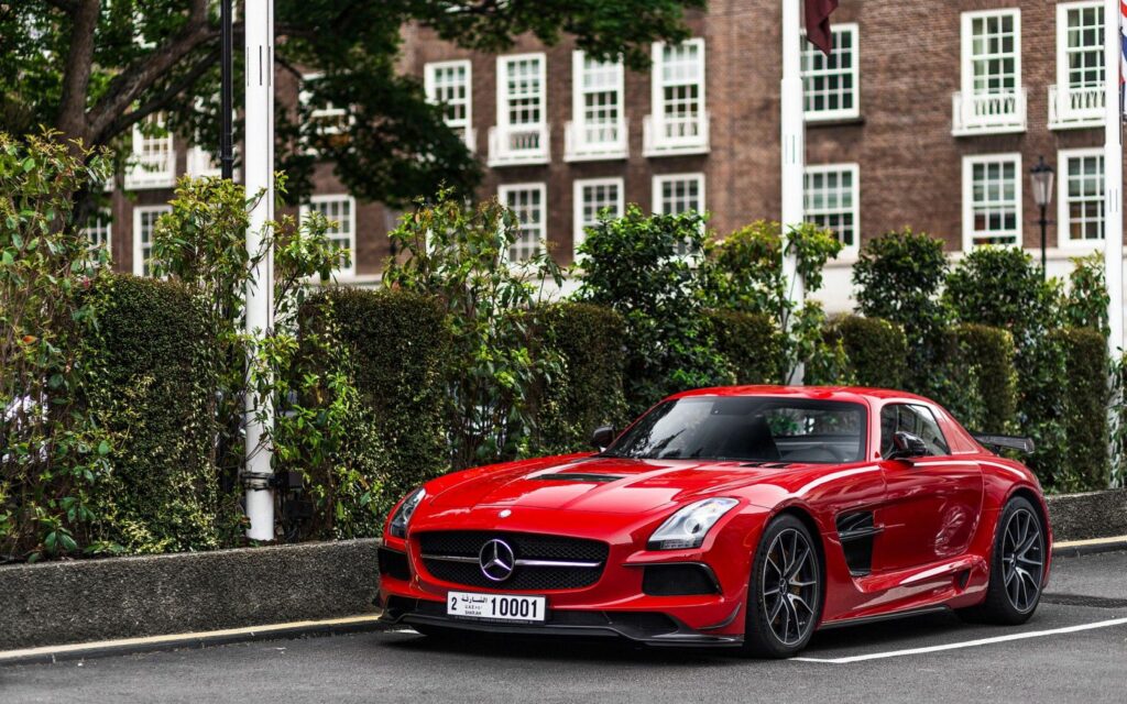 Sleek Red Mercedes-Benz SLS: Urban Elegance & Performance Wallpaper
