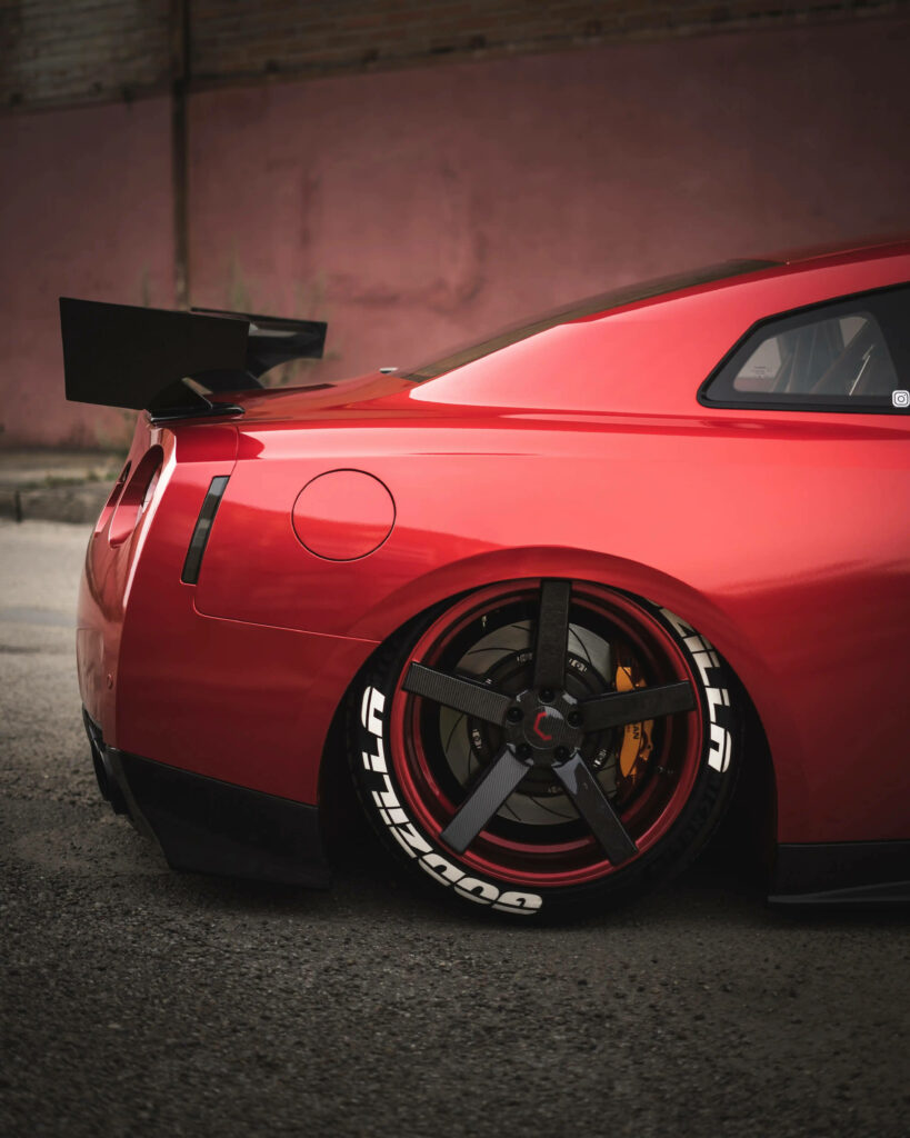 Stunning Red Nissan GTR Wallpaper: Bold Modifications & Sporty Design