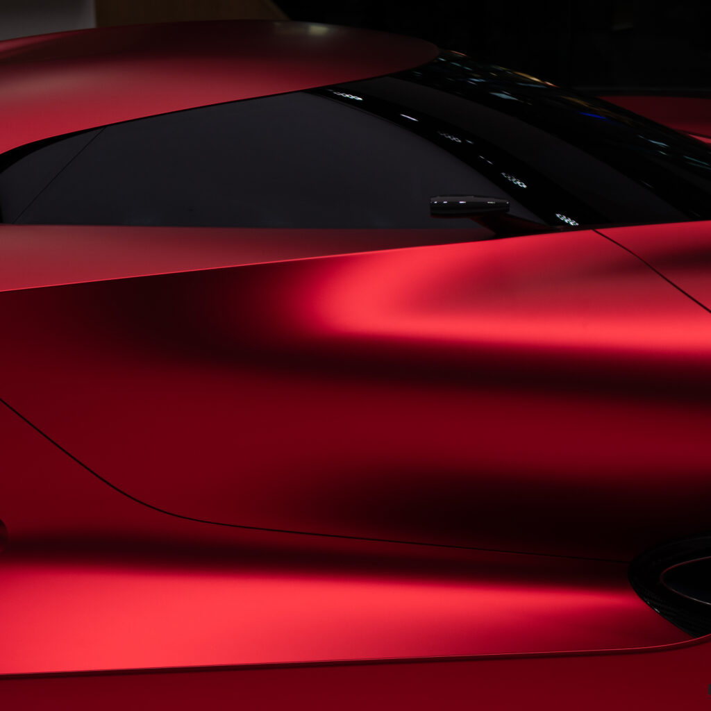 Sleek Red Supercar Wallpaper: Sporty & Sophisticated Design