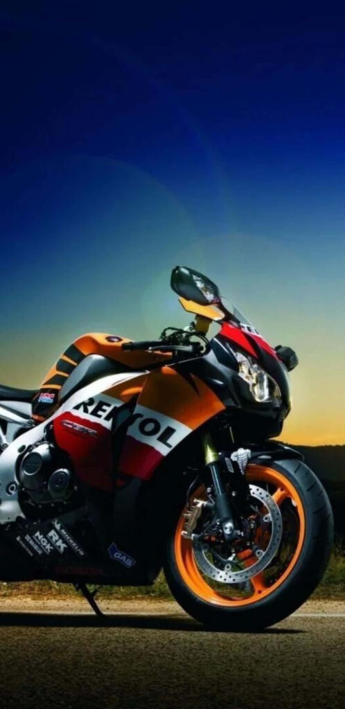 Repsol Sports Bike Wallpaper: Vibrant Sunset Road Adventure