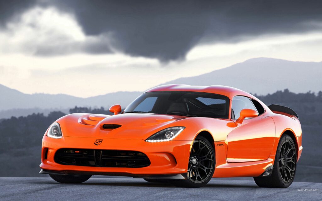 Vivid Orange SRT Viper Wallpaper: Dynamic Design & Dramatic Background