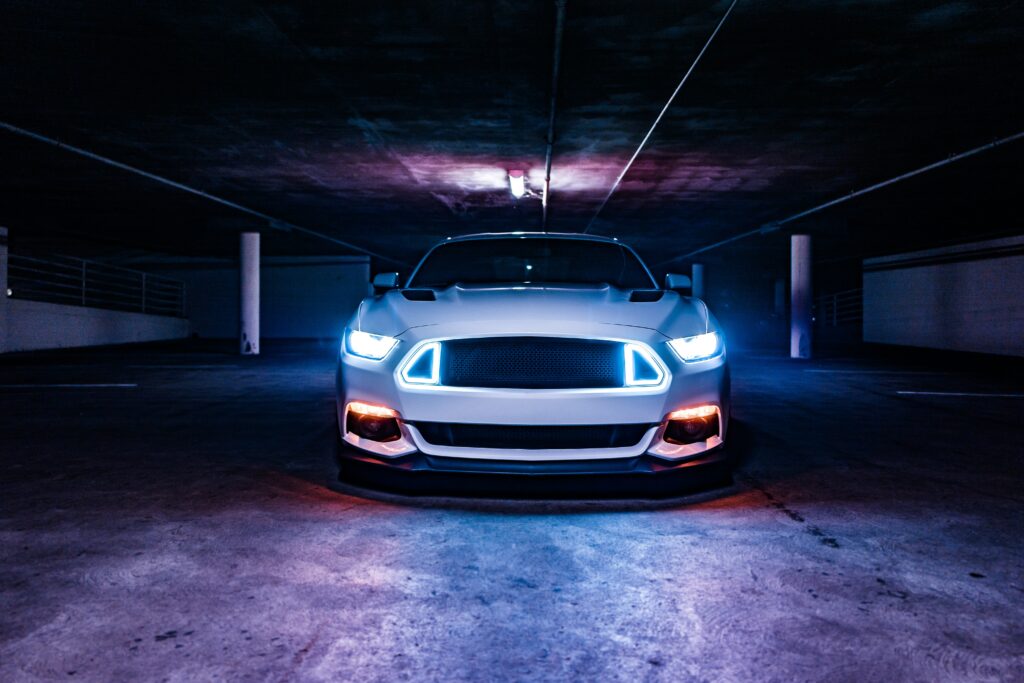 Sleek Shelby Mustang in Dramatic Garage Lighting - High-Res Wallpaper